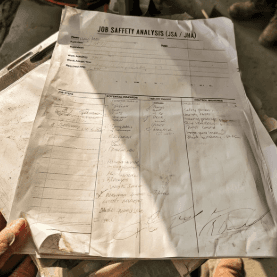 Photo of a completed job safety analysis form.
